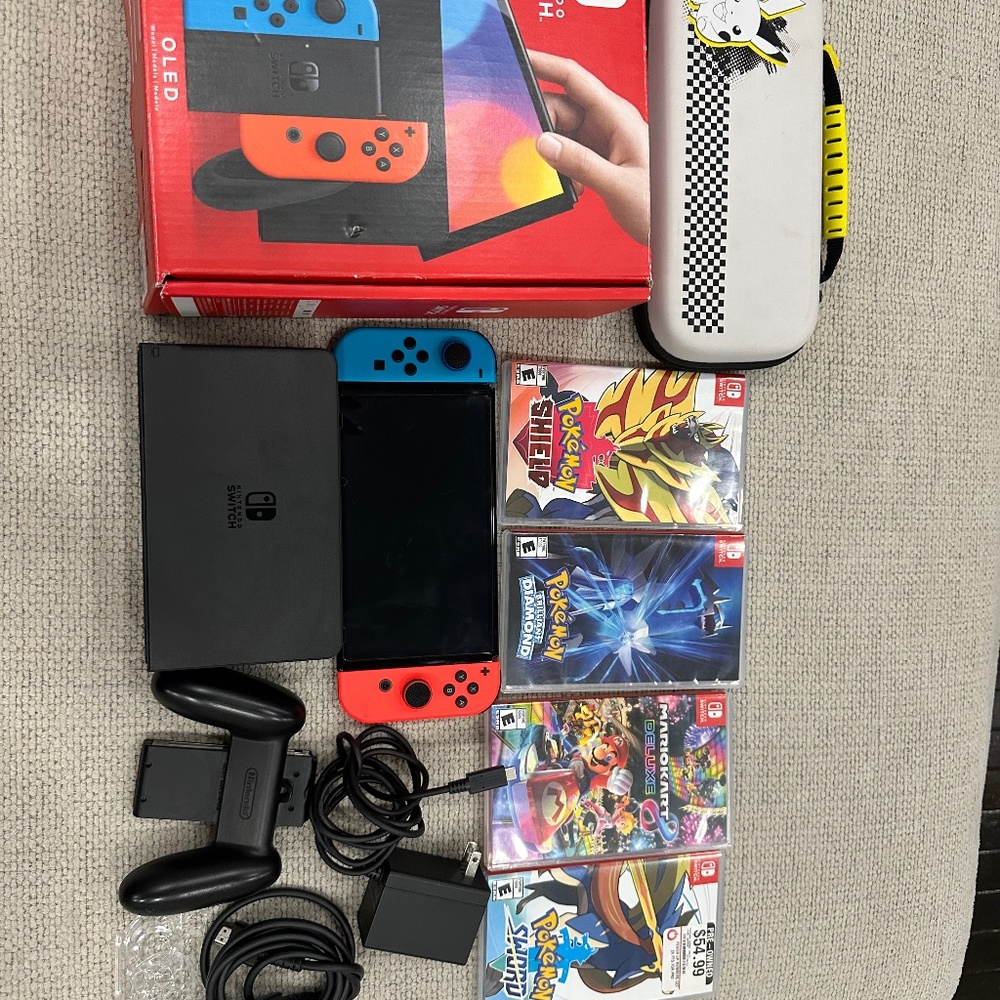 Nintendo Switch OLED Model HEG-001 - 64GB -  Red/Blue, **BUNDLE DEAL** +4 games